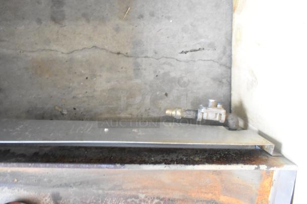 Standard Range SR-G36-M stainless steel commercial countertop natural gas griddle, visible wear, natural gas inlet view.