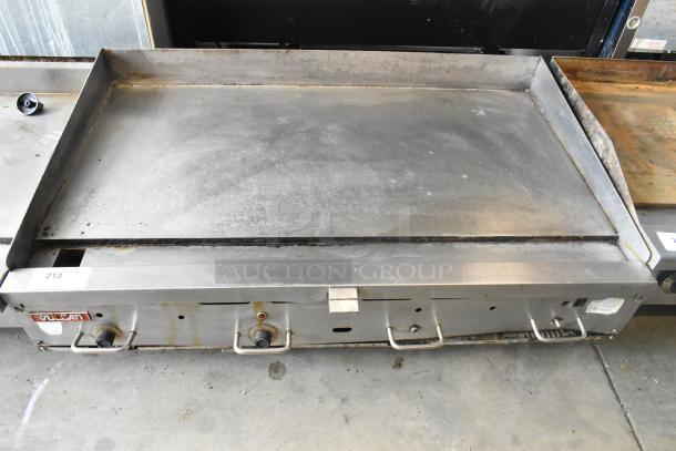 Vulcan 48RPG-E stainless steel commercial flat top griddle, natural gas powered, with visible controls, in used condition.