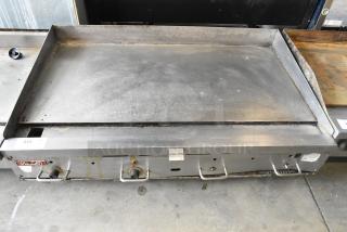 Vulcan 48RPG-E stainless steel commercial flat top griddle, natural gas powered, with visible controls, in used condition.