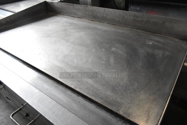 Vulcan 48RPG-E stainless steel commercial countertop natural gas griddle, flat top, used condition.