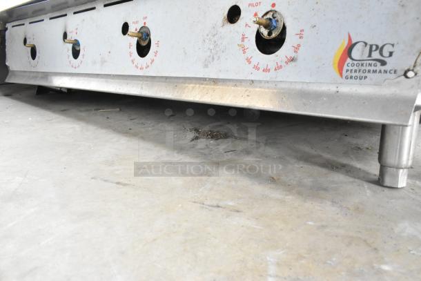Cooking Performance Group stainless steel commercial gas griddle, visible burner knobs, CPG logo, used condition.
