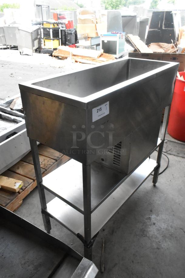 Stainless steel commercial refrigerated cold pan, freestanding with lower shelf, lightly used, tag marked "215".