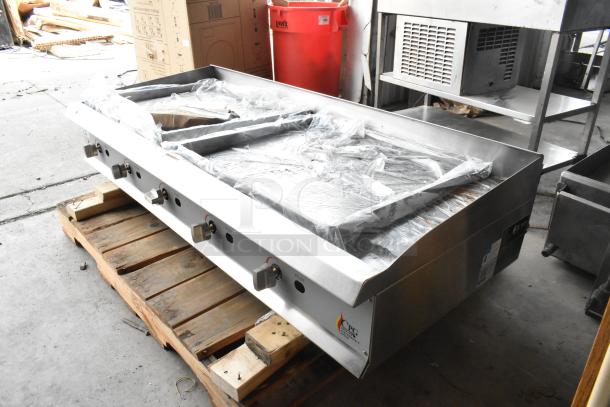 Brand new 2023 CPG 351GMCPG60NL 60" gas griddle, stainless steel, manual controls, 150,000 BTU, minor scratches.