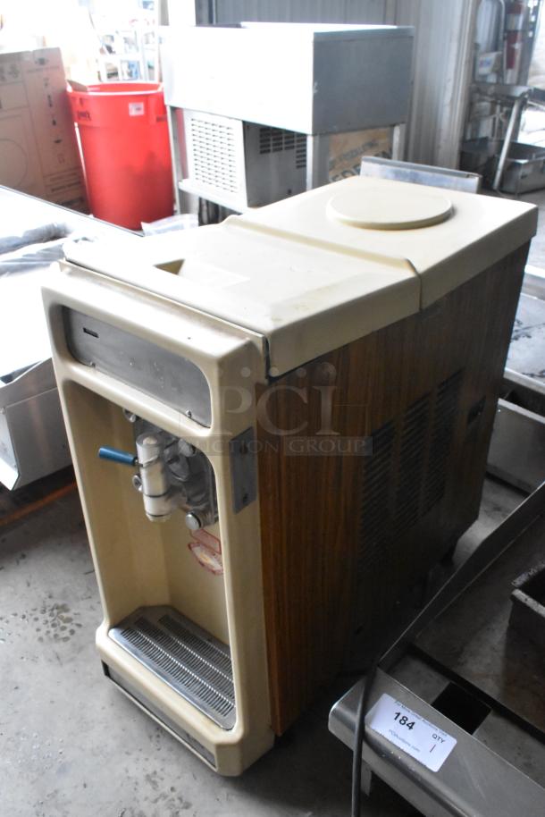 Taylor 450-12 metal commercial beverage machine, single flavor, 115 volts, 1 phase, used condition, countertop design.
