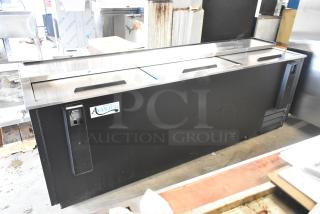 Brand new 2024 Avantco 178HBB95HC 95" black metal bottle cooler with minor scratches. 115V, ideal for commercial use.