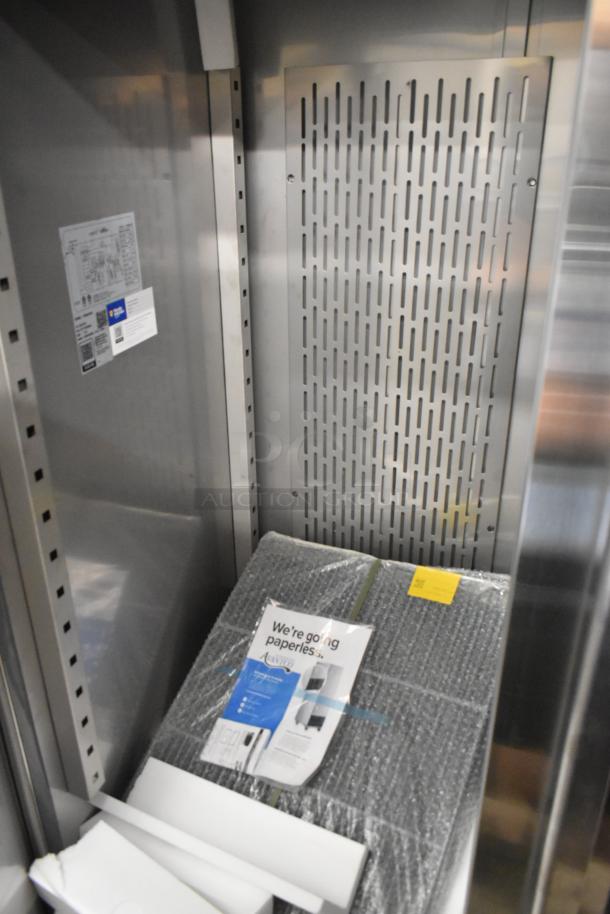 Brand new Avantco 178SS3FHC stainless steel 3-door reach-in cooler, includes poly-coated racks, on commercial casters.
