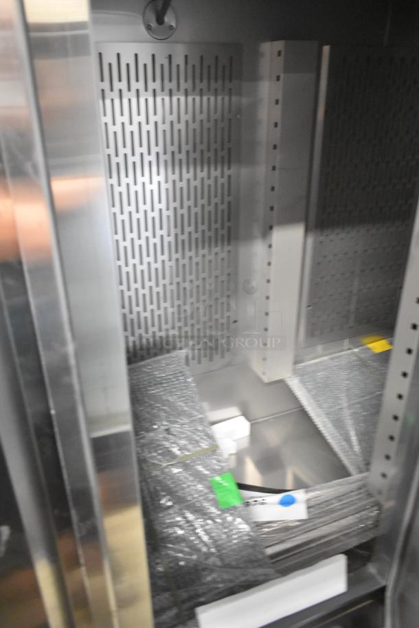 Brand new Avantco 178SS3FHC, 3-door cooler, stainless steel, poly coated racks, commercial casters, 115V, 1 phase.