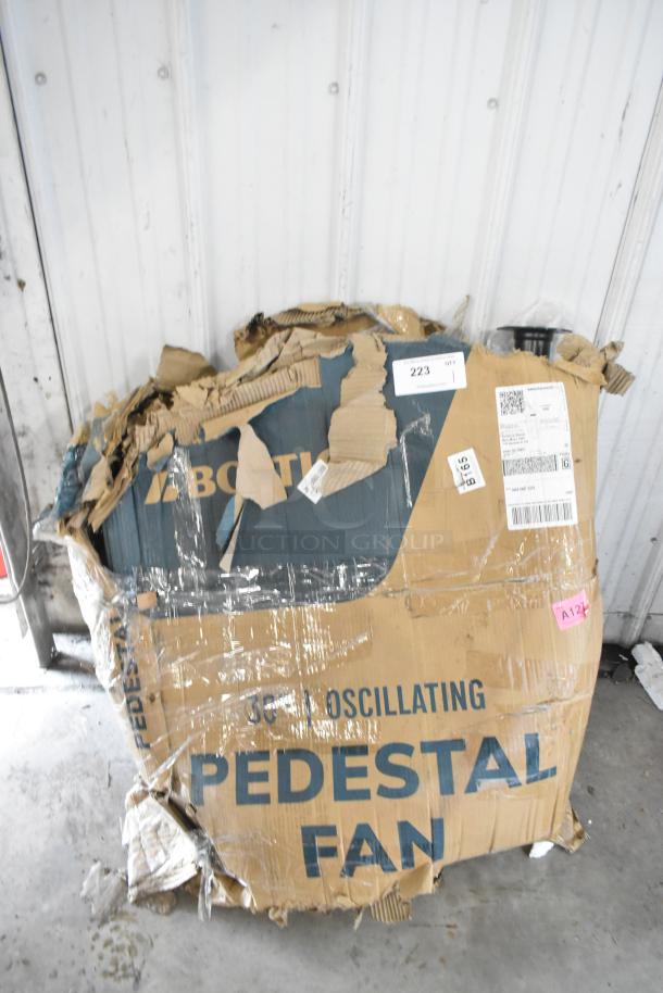 Brand new Boltic 30" oscillating pedestal fan in damaged packaging, showing shipping labels and minor handling wear.