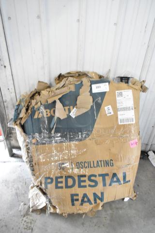 Brand new Boltic 30" oscillating pedestal fan in damaged packaging, showing shipping labels and minor handling wear.