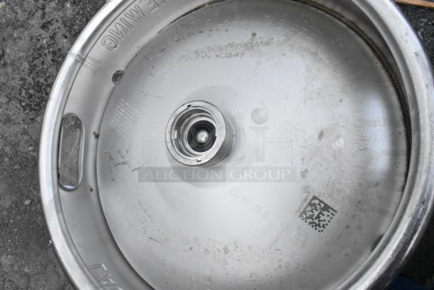 Two metal half barrel kegs with visible markings, used condition. Indicated brand: Lagunitas Brewing, Petaluma, CA.