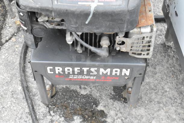 Craftsman 580.762250 Pressure Washer, 6HP, 2250 PSI, 2.2 GPM. Used condition with visible wear, prominent branding.