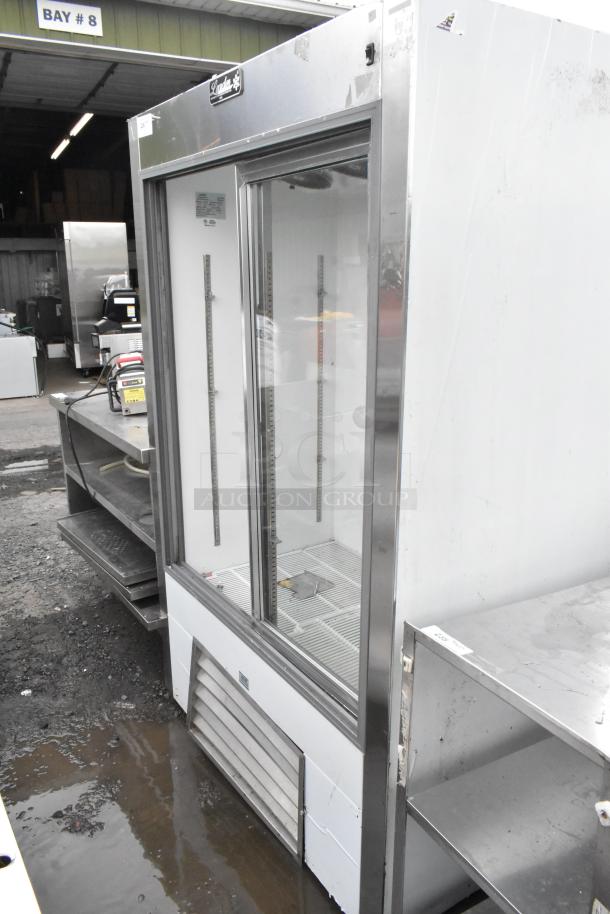 Leader LS48 S/C 2-door reach-in cooler merchandiser, metal, 115 volts, 1 phase. Used condition with visible scratches and vents.