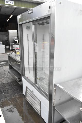 Leader LS48 S/C 2-door reach-in cooler merchandiser, metal, 115 volts, 1 phase. Used condition with visible scratches and vents.