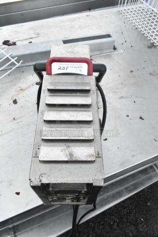 Vito 80 Stainless Steel Fryer Oil Filter System, visible handles and label, in used condition, 100-120V, 1 Phase.