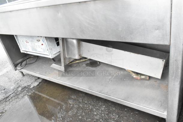Atlas Metal stainless steel commercial ice bin with right side single sink bay, visible components underneath.