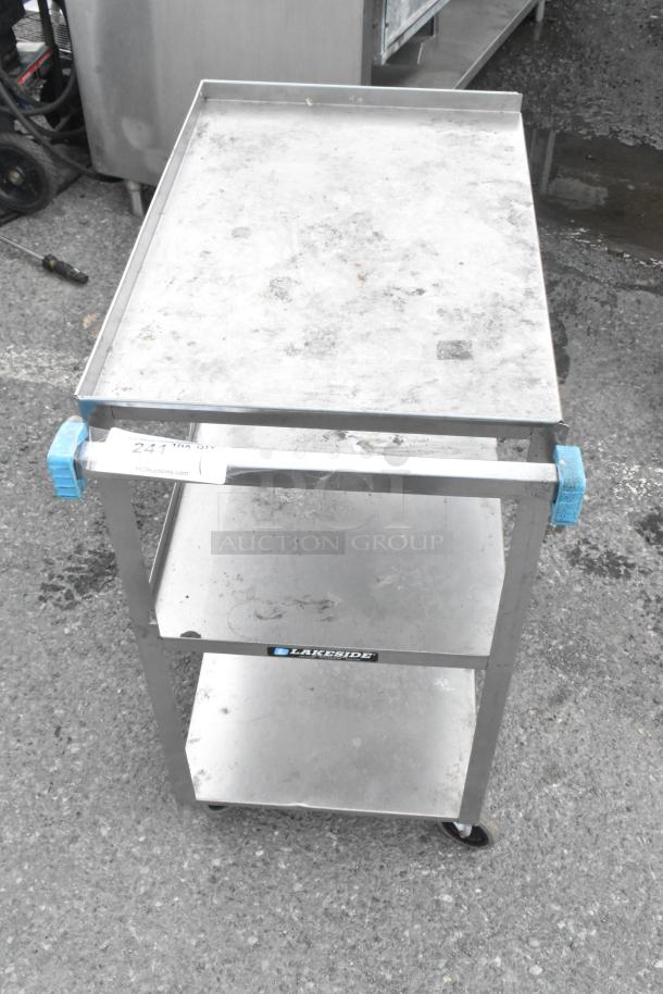 Lakeside Metal 3 Tier Cart with commercial casters. Shows visible wear. Features robust shelving and mobility.