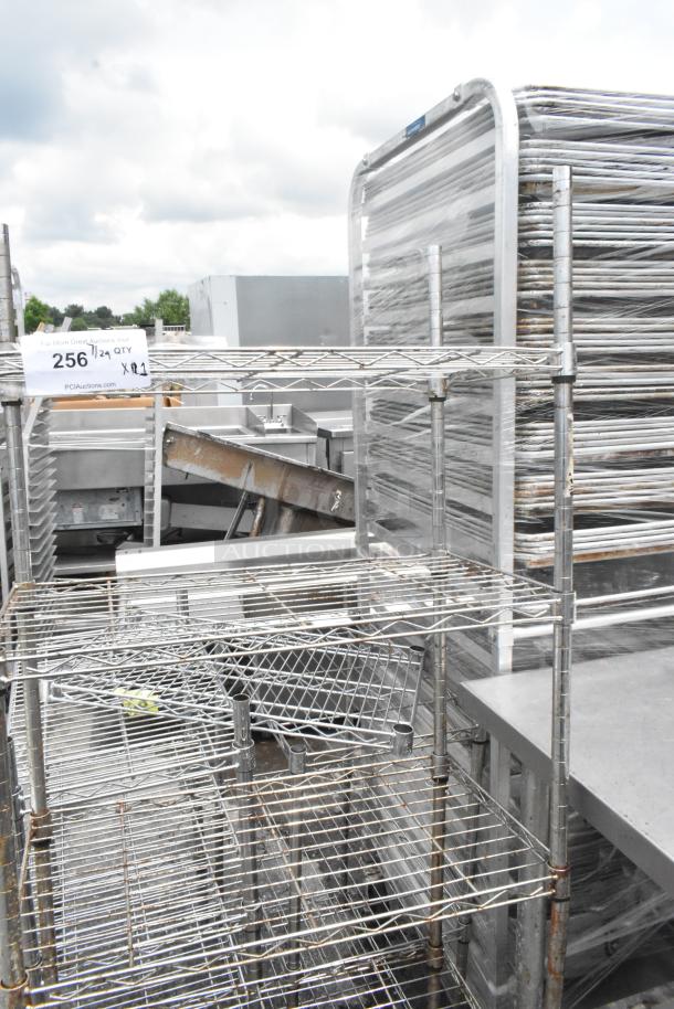 Chrome finish 5 tier wire shelving unit, used condition, requires dismantling for shipping, freight charges apply.