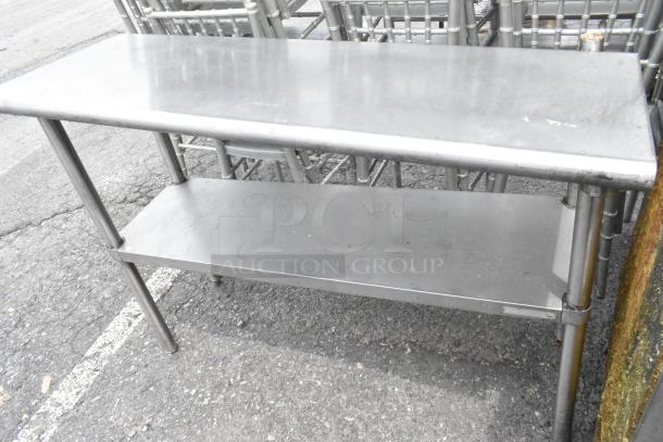 Stainless steel table with metal under shelf, showing a clean surface and sturdy build, suitable for commercial use.