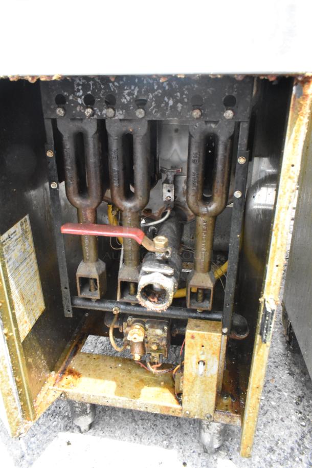 American Range AF-35/50 fryer interior showing wear; natural gas powered, 40,000 BTU, stainless steel, commercial use.