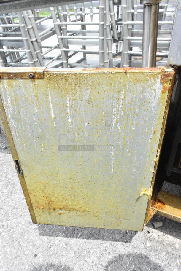 Rusted panel on an American Range AF-35/50 commercial fryer, stainless steel model. Shows significant wear.