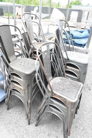 Stacked metal Tolix-style dining chairs, weathered condition. Set of 17, each multiplies the bid by 17. Marked with number 266.