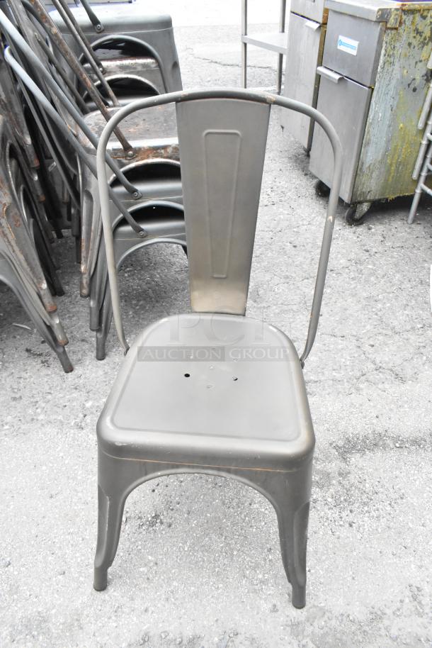 Tolix style metal dining chair, stackable, industrial design, gray finish, visible wear, perforated seat, auction lot of 17.