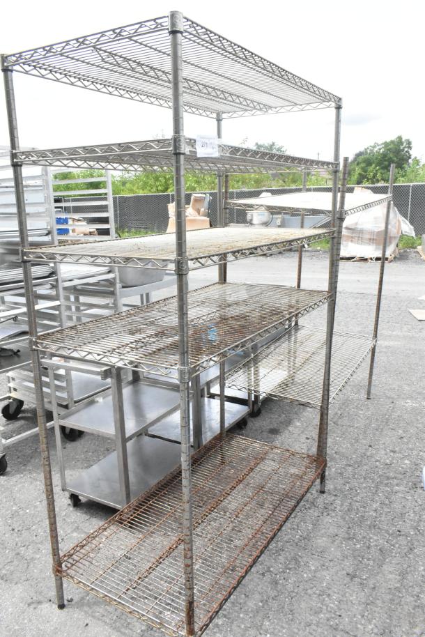 Chrome finish wire shelving units, 48x24x72.5 inches, visible rust, buyer must dismantle, freight charges apply.
