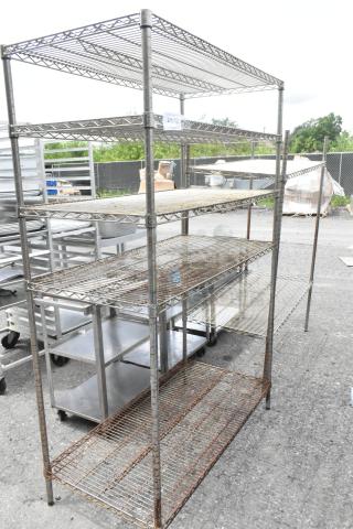 Chrome finish wire shelving units, 48x24x72.5 inches, visible rust, buyer must dismantle, freight charges apply.