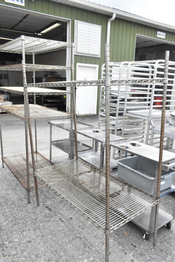 2 chrome wire shelving units, each 48x24x72.5 inches. Rust visible. Buyer dismantles. Consider freight charges.