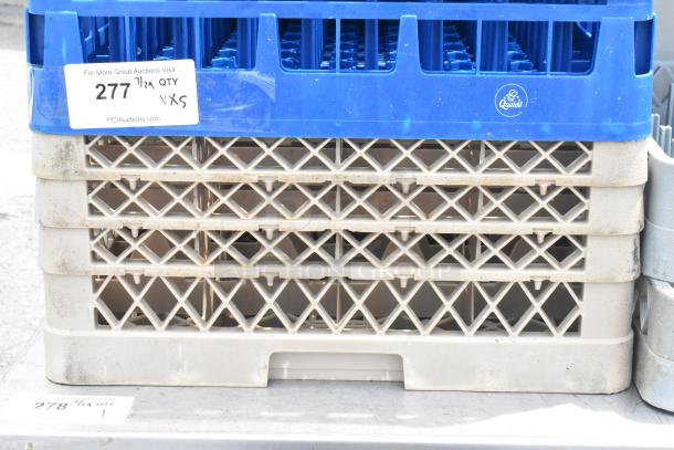 Five poly dish caddies in stack; blue top crate with signs of wear, label indicates auction information.