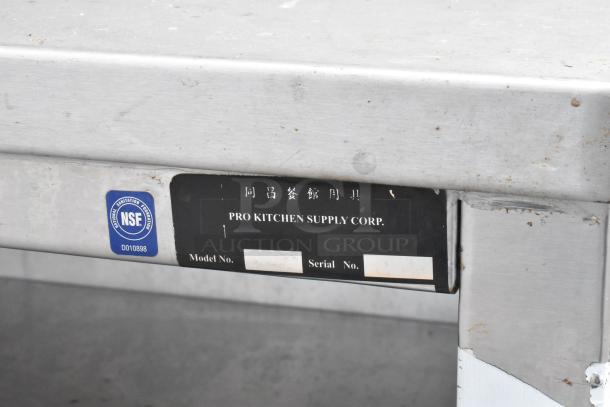 Stainless Steel Table by Pro Kitchen Supply Corp with over shelf, 2 under shelves. Features NSF label, model and serial number slots visible.