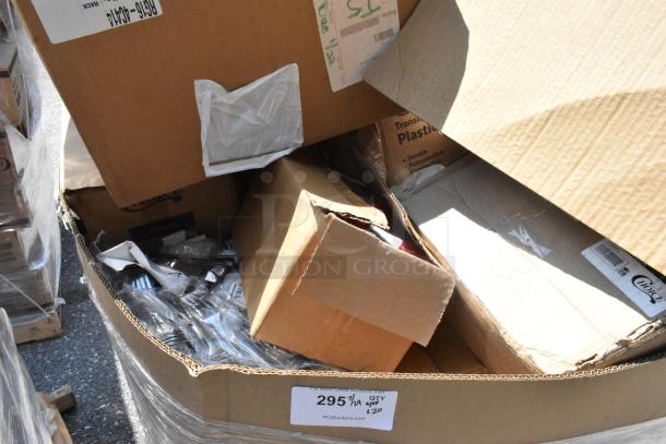 Cardboard boxes containing scratch and dent items like seasoning, dish caddy, and sandwich wrap, labeled for auction.