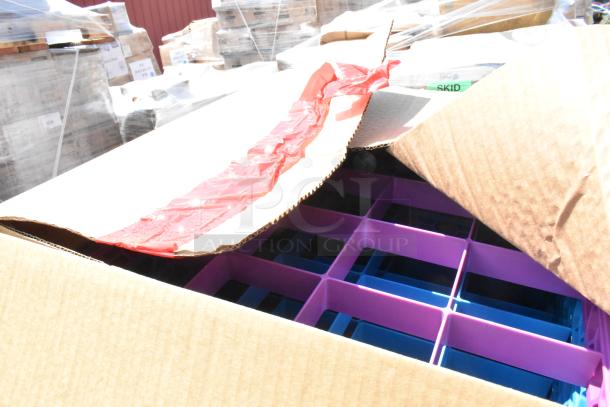 Cardboard box with purple and blue dish caddies visible, packaging open, light wear. New scratch and dent condition.