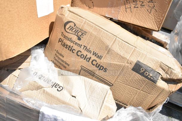 Damaged box labeled "Choice Translucent Thin Wall Plastic Cold Cups" with 9 oz capacity, showing product and condition tags.