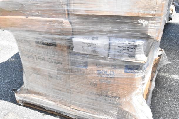 Plastic-wrapped pallet with new medium weight forks and Solo plastic cups, labeled for auction, minor scratches, sold as seen.
