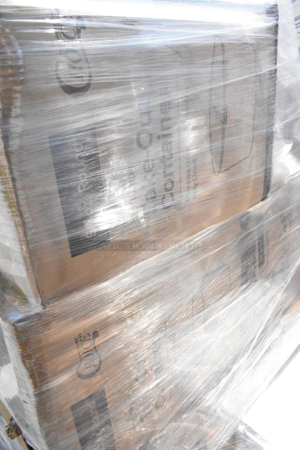 Pallet of assorted scratch and dent items wrapped in plastic, including containers, towels, and gloves. Boxes visible.