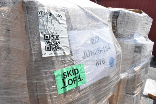 Pallet of brand new scratch and dent items, shrink-wrapped, with labels indicating "SKID 1 OF 4," including wok, glasses, winch, containers.