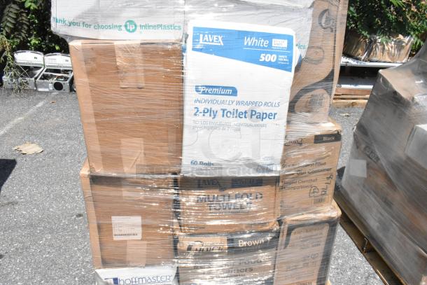 Pallet with assorted new scratch and dent items, including toilet paper, multi-fold towels, food trays, and coffee bags.