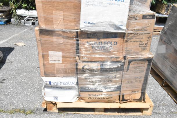 Boxes of new items on a pallet wrapped in plastic, including Hoffmaster towels and take-out containers. Labels visible.