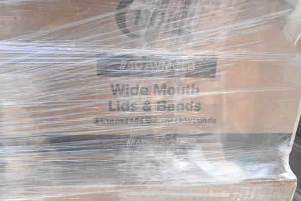 Boxes of 407WMCLB Choice Wide Mouth Lids and Bands, 48/Pack, visible through plastic wrap; condition: scratch and dent.