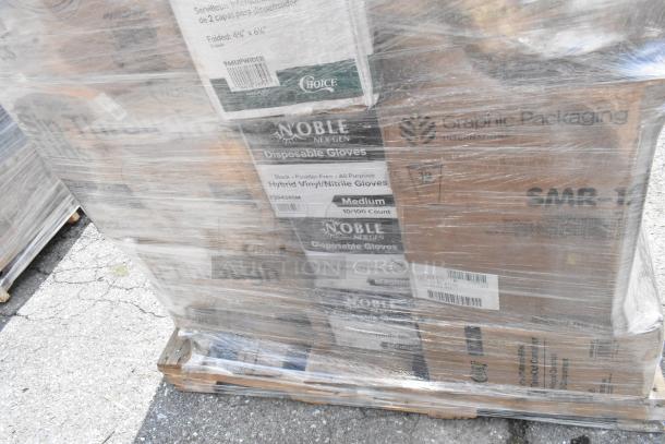 Stack of shrink-wrapped boxes labeled "Noble NEX GEN Disposable Gloves," "Graphic Packaging," mixed goods, new scratch and dent items.
