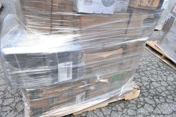 Pallet of assorted scratch and dent items including paper towels, vacuum packaging pouches, cold cups, and to-go containers, wrapped in plastic.