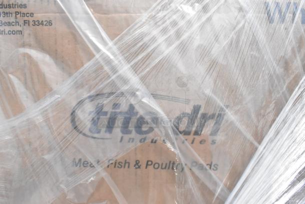Plastic-wrapped box labeled "Titedri Industries, Meat, Fish & Poultry Pads." Contains 20 new scratch and dent items.
