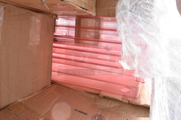 Boxes containing various new, scratch and dent items, including glass racks, visible through packaging.