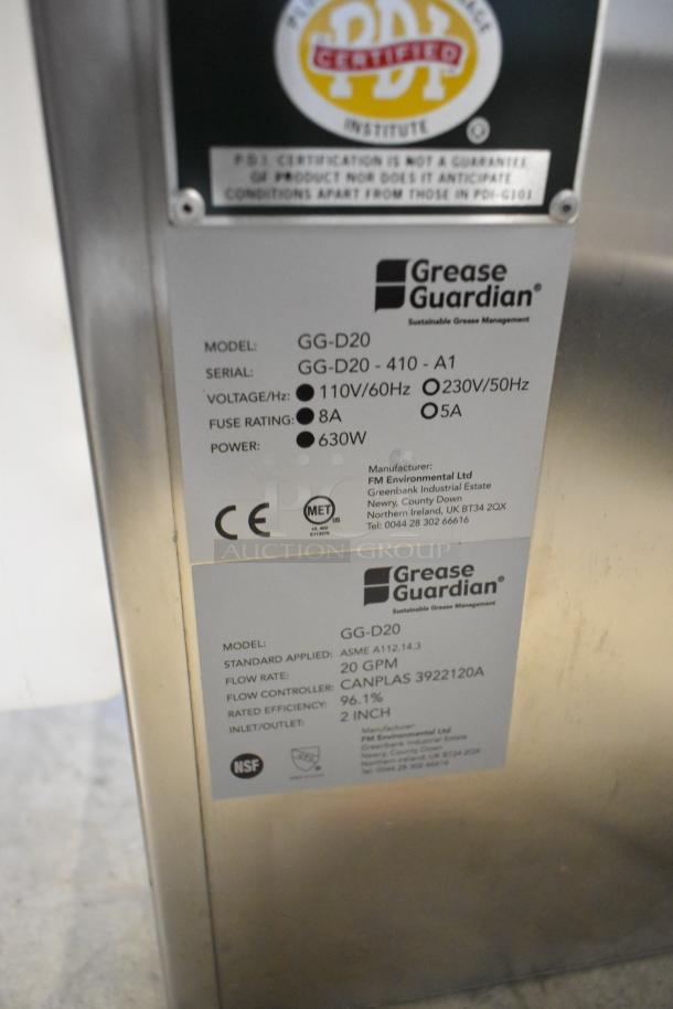 Brand new Grease Guardian GG-D20 grease removal unit, 50 lb capacity, stainless steel, 110V, 1 phase, with certification labels.
