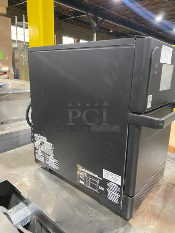 Merrychef Eikon E2S black countertop high-speed oven, 2022 model, electric, 208/240V, near-new condition, visible labels.