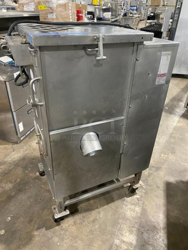 Biro commercial electric meat mixer/grinder on casters, stainless steel, automatic feed, used condition, industrial kitchen equipment.