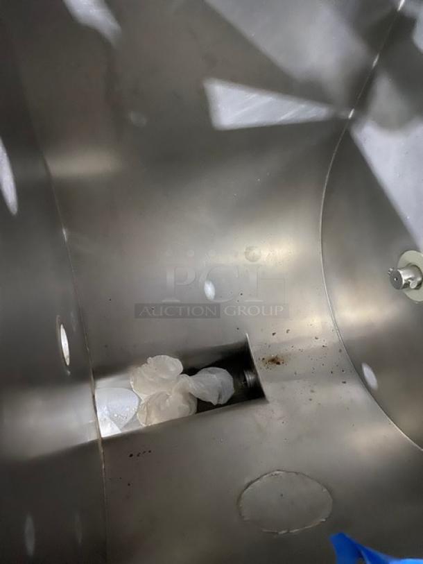 Biro commercial electric meat mixer/grinder interior view, stainless steel, with automatic feed and casters, in used condition.