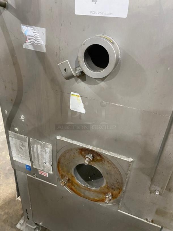 Biro commercial electric meat mixer/grinder on casters. Features include automatic feed, stainless steel finish, and visible wear.