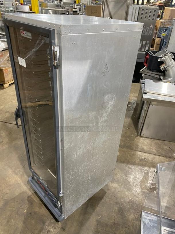 Metro C5-1 Series glass door heated cabinet, model C519-CFC-U, non-insulated, 120V, on casters, good condition.